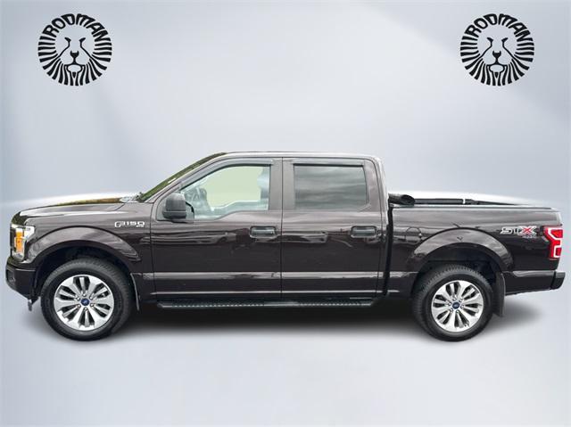 used 2018 Ford F-150 car, priced at $25,521