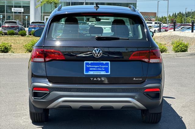 used 2024 Volkswagen Taos car, priced at $22,995