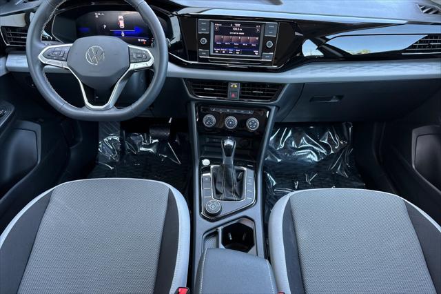 used 2024 Volkswagen Taos car, priced at $22,995