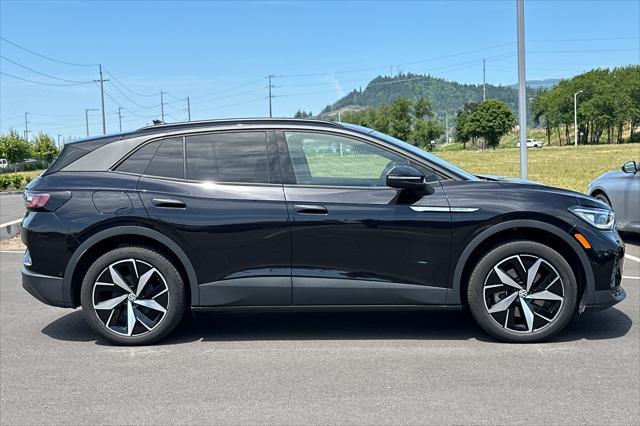 used 2023 Volkswagen ID.4 car, priced at $27,988