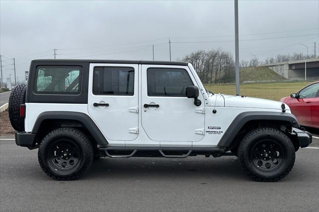 used 2013 Jeep Wrangler Unlimited car, priced at $16,595