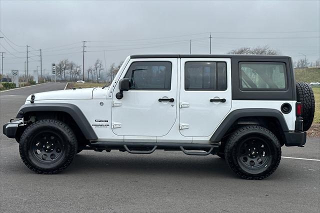 used 2013 Jeep Wrangler Unlimited car, priced at $16,595