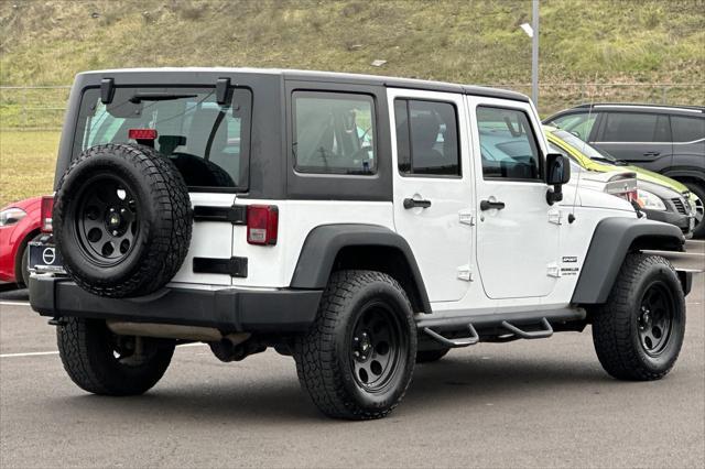 used 2013 Jeep Wrangler Unlimited car, priced at $16,595