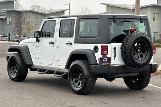 used 2013 Jeep Wrangler Unlimited car, priced at $16,595