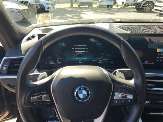 used 2024 BMW 330e car, priced at $30,690