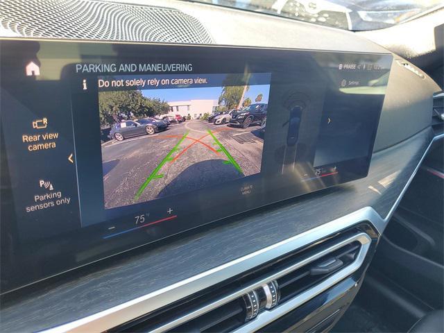 used 2024 BMW 330e car, priced at $30,690