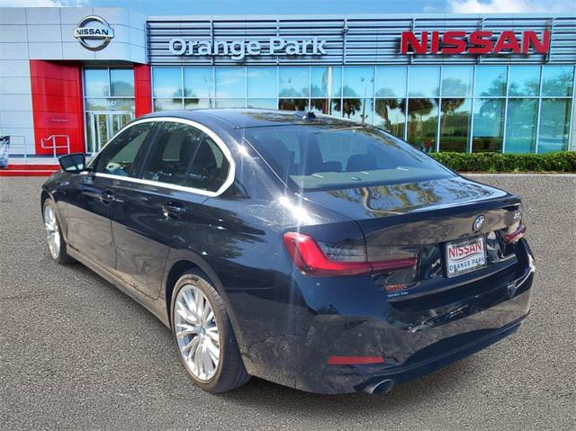 used 2024 BMW 330e car, priced at $30,690