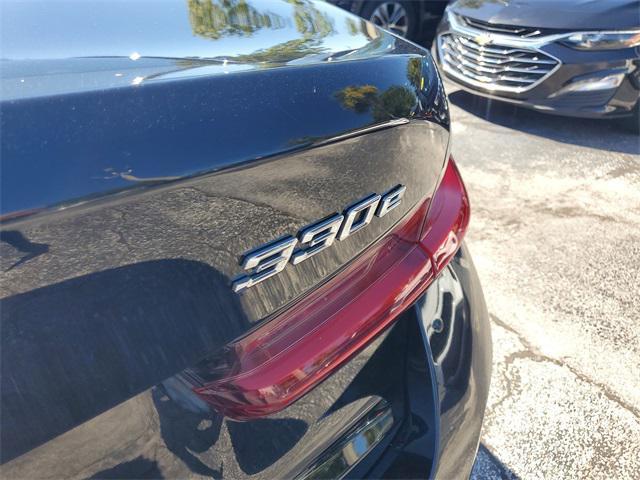 used 2024 BMW 330e car, priced at $30,690