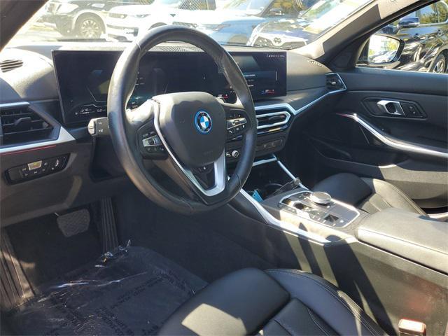 used 2024 BMW 330e car, priced at $30,690