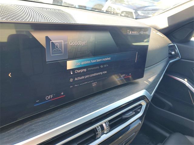 used 2024 BMW 330e car, priced at $30,690
