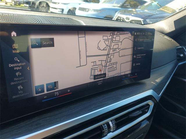 used 2024 BMW 330e car, priced at $30,690