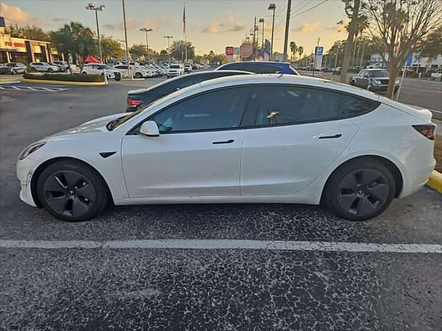 used 2023 Tesla Model 3 car, priced at $28,000