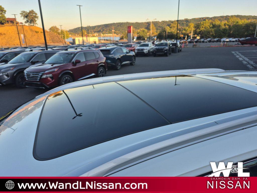 used 2021 Nissan Rogue car, priced at $25,253
