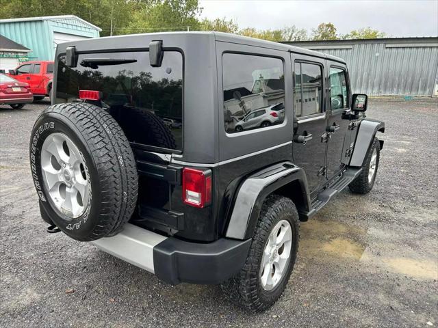 used 2014 Jeep Wrangler Unlimited car, priced at $19,495