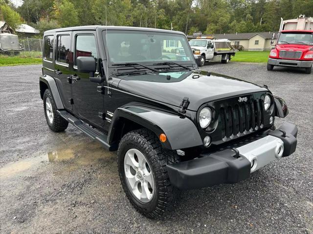 used 2014 Jeep Wrangler Unlimited car, priced at $19,495