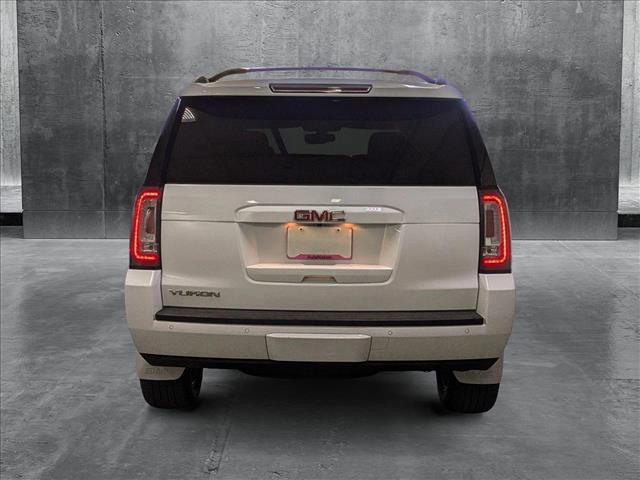 used 2018 GMC Yukon car, priced at $23,936