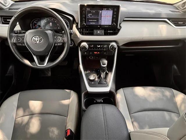 used 2021 Toyota RAV4 Hybrid car, priced at $34,567