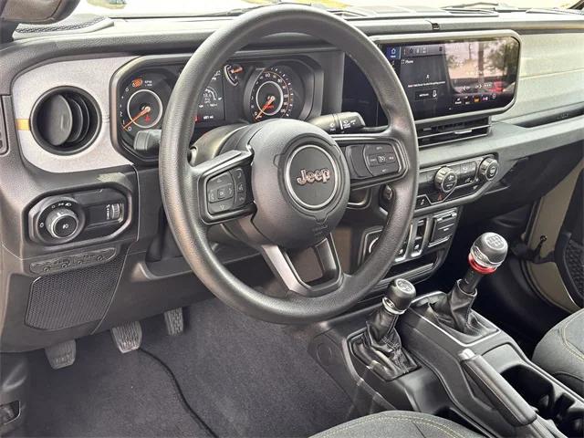 used 2025 Jeep Wrangler car, priced at $27,939