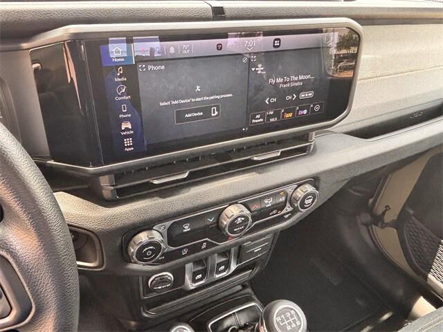 used 2025 Jeep Wrangler car, priced at $27,939