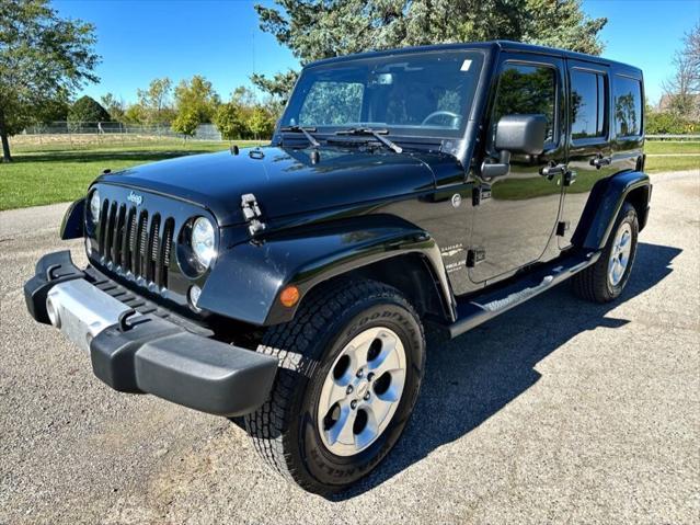 used 2014 Jeep Wrangler Unlimited car, priced at $18,900