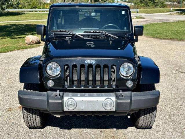 used 2014 Jeep Wrangler Unlimited car, priced at $18,900