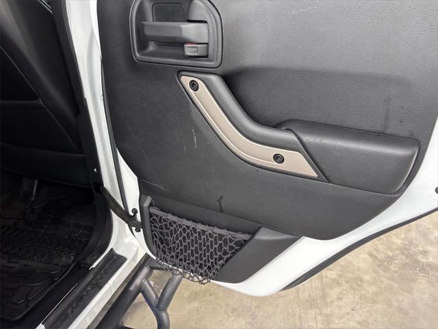 used 2016 Jeep Wrangler Unlimited car, priced at $16,097