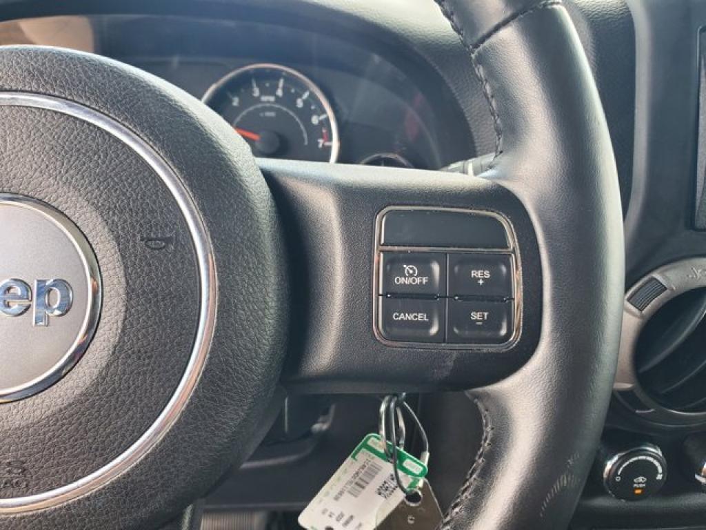 used 2014 Jeep Wrangler Unlimited car, priced at $21,591