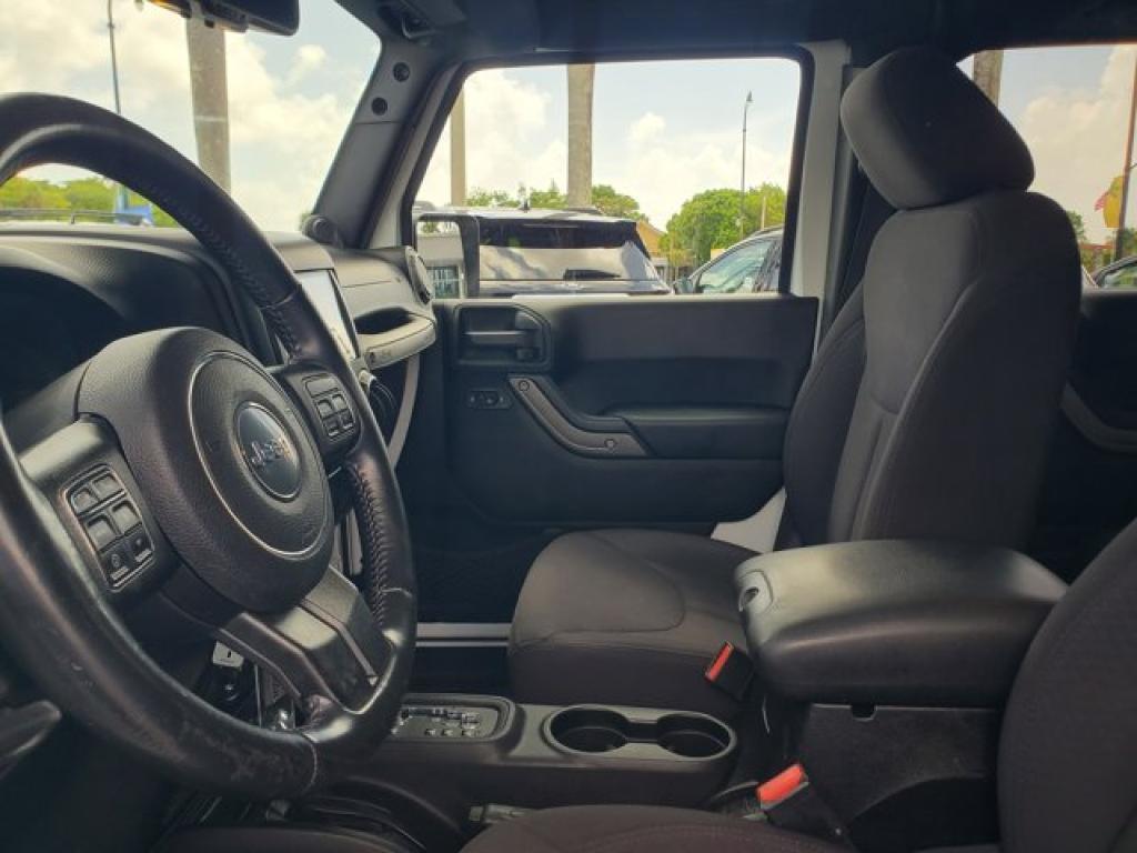 used 2014 Jeep Wrangler Unlimited car, priced at $21,591