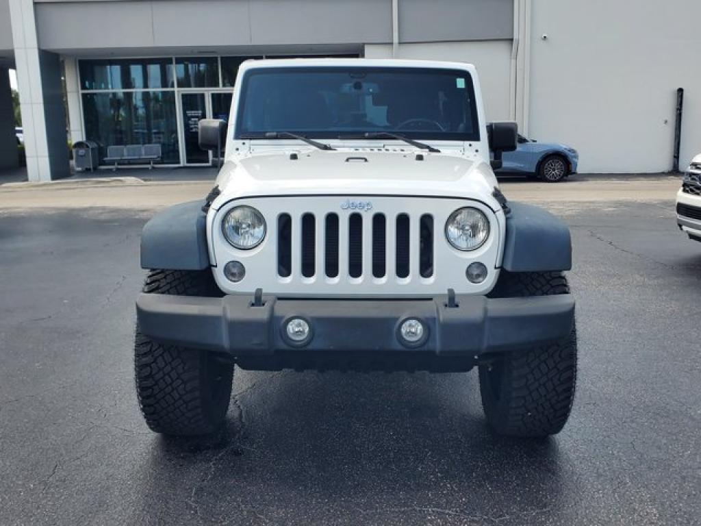 used 2014 Jeep Wrangler Unlimited car, priced at $21,591