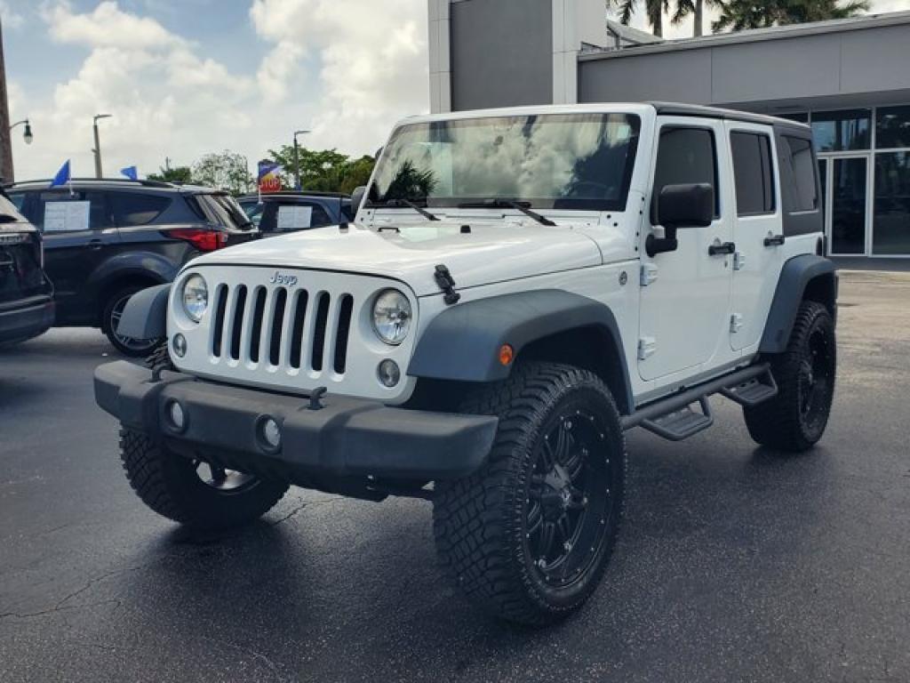 used 2014 Jeep Wrangler Unlimited car, priced at $21,591