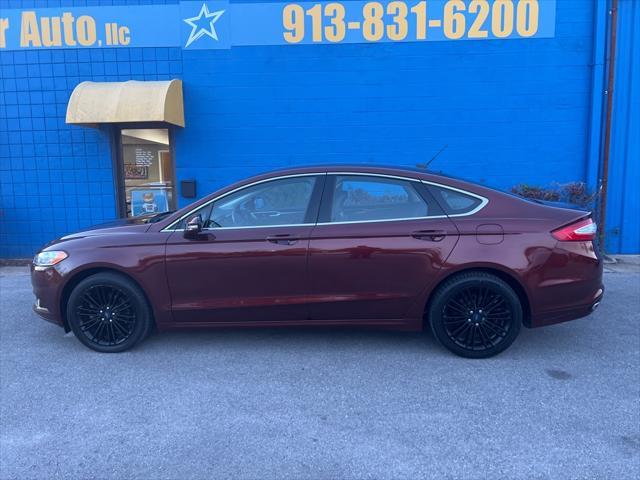 used 2015 Ford Fusion car, priced at $8,998