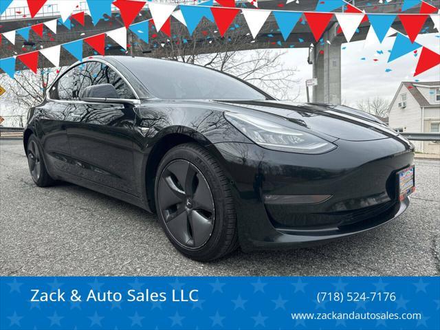 used 2018 Tesla Model 3 car, priced at $14,900