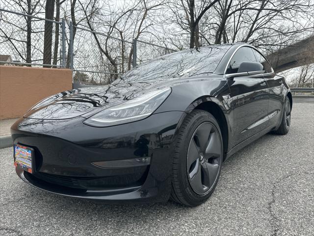 used 2018 Tesla Model 3 car, priced at $14,900