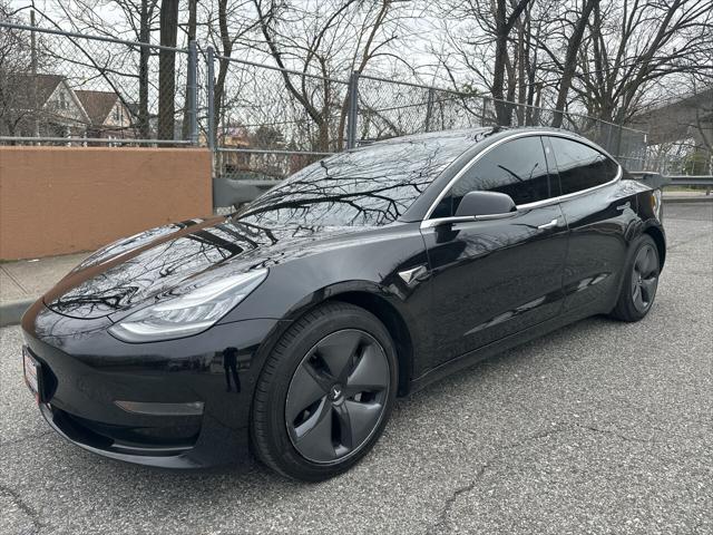 used 2018 Tesla Model 3 car, priced at $14,900