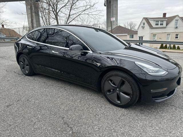 used 2018 Tesla Model 3 car, priced at $14,900