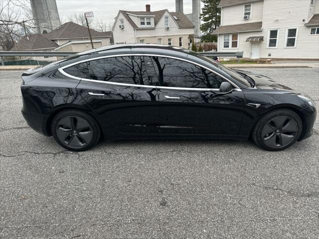 used 2018 Tesla Model 3 car, priced at $14,900