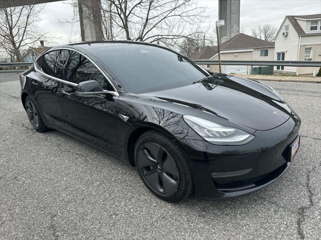 used 2018 Tesla Model 3 car, priced at $14,900