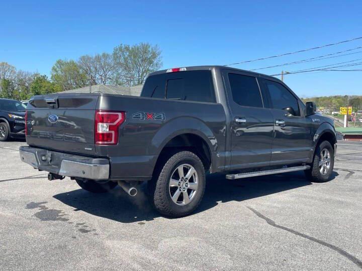 used 2018 Ford F-150 car, priced at $27,588