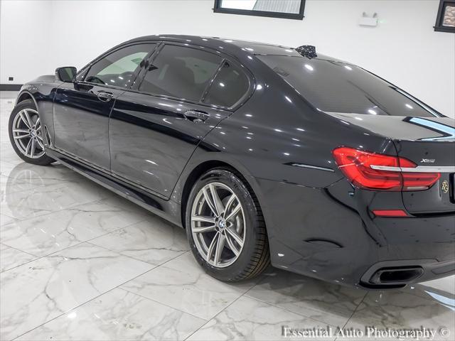 used 2018 BMW 750 car, priced at $21,495