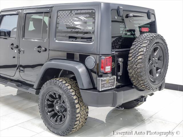 used 2015 Jeep Wrangler Unlimited car, priced at $18,424
