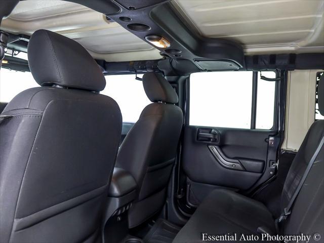used 2015 Jeep Wrangler Unlimited car, priced at $18,424