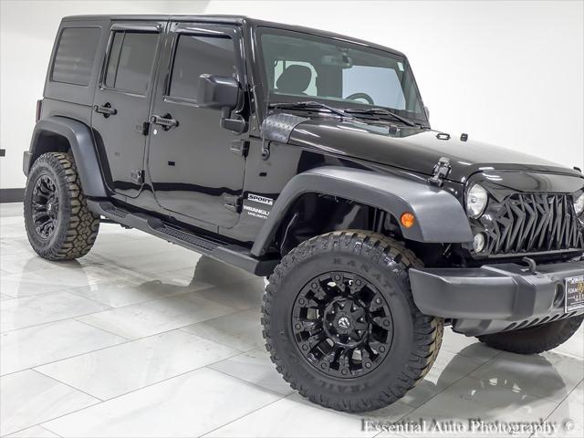 used 2015 Jeep Wrangler Unlimited car, priced at $18,424