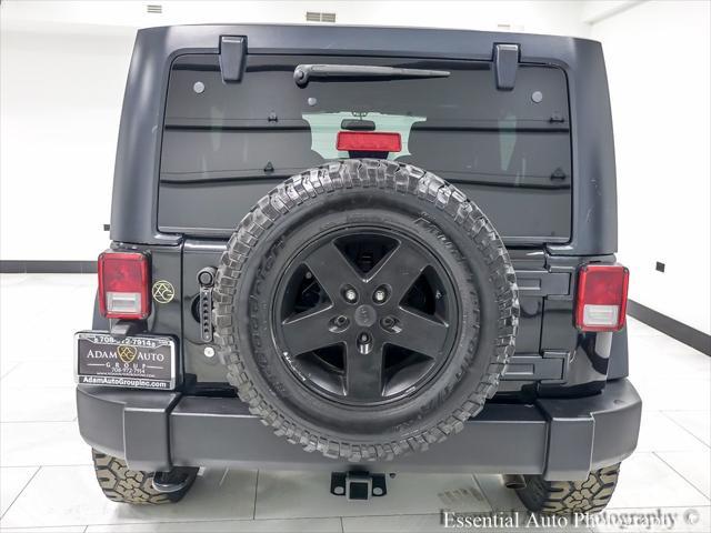 used 2015 Jeep Wrangler Unlimited car, priced at $18,424