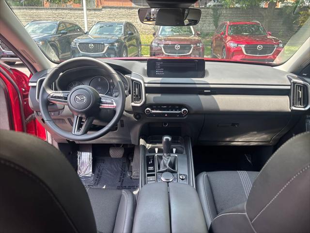 used 2024 Mazda CX-50 car, priced at $30,906