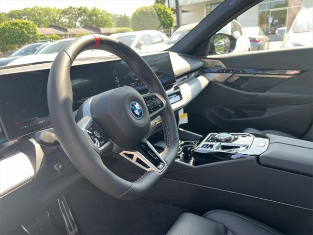 new 2025 BMW i5 car, priced at $89,325
