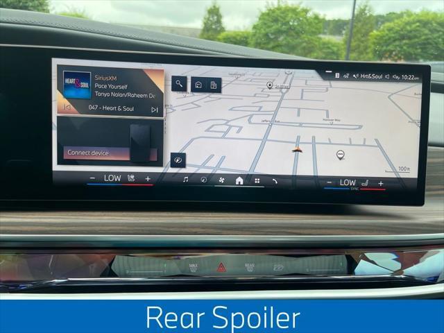 new 2025 BMW 740 car, priced at $103,225