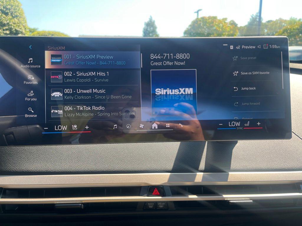 new 2026 BMW iX car, priced at $95,220