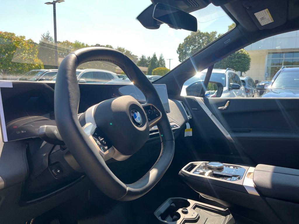 new 2026 BMW iX car, priced at $95,220