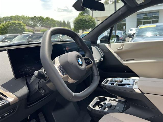 new 2026 BMW iX car, priced at $86,170