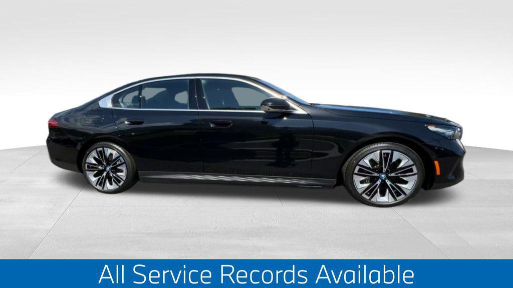used 2024 BMW i5 car, priced at $60,083